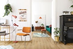 Stylish compositon of retro home interior with mock up poster frame, vintage orange chair, piano,furnitures, design lamps, gold shelf, plants and elegant accessories. Nice home decor of living rooms.